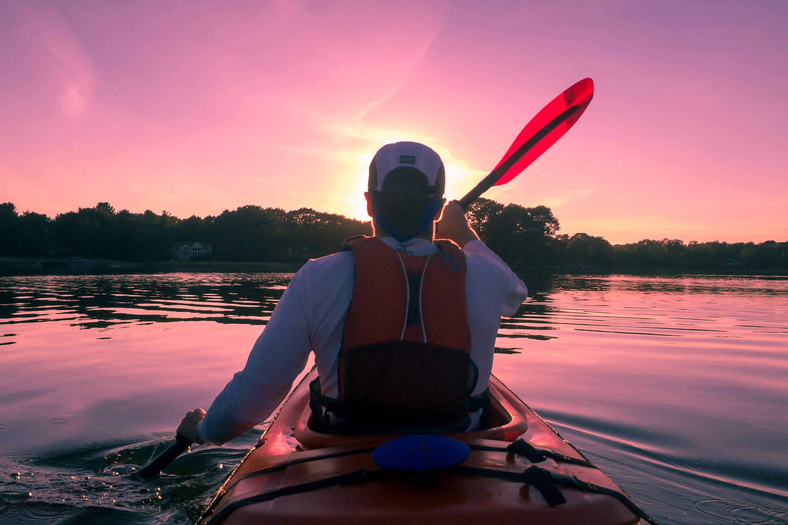 Paddling on the lake at sunset